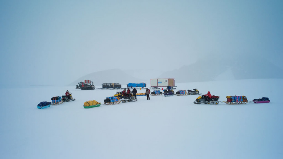 Japanese scientists on their way to establish their base camp in the field. Sor Rondanes moutains, Antarctica.