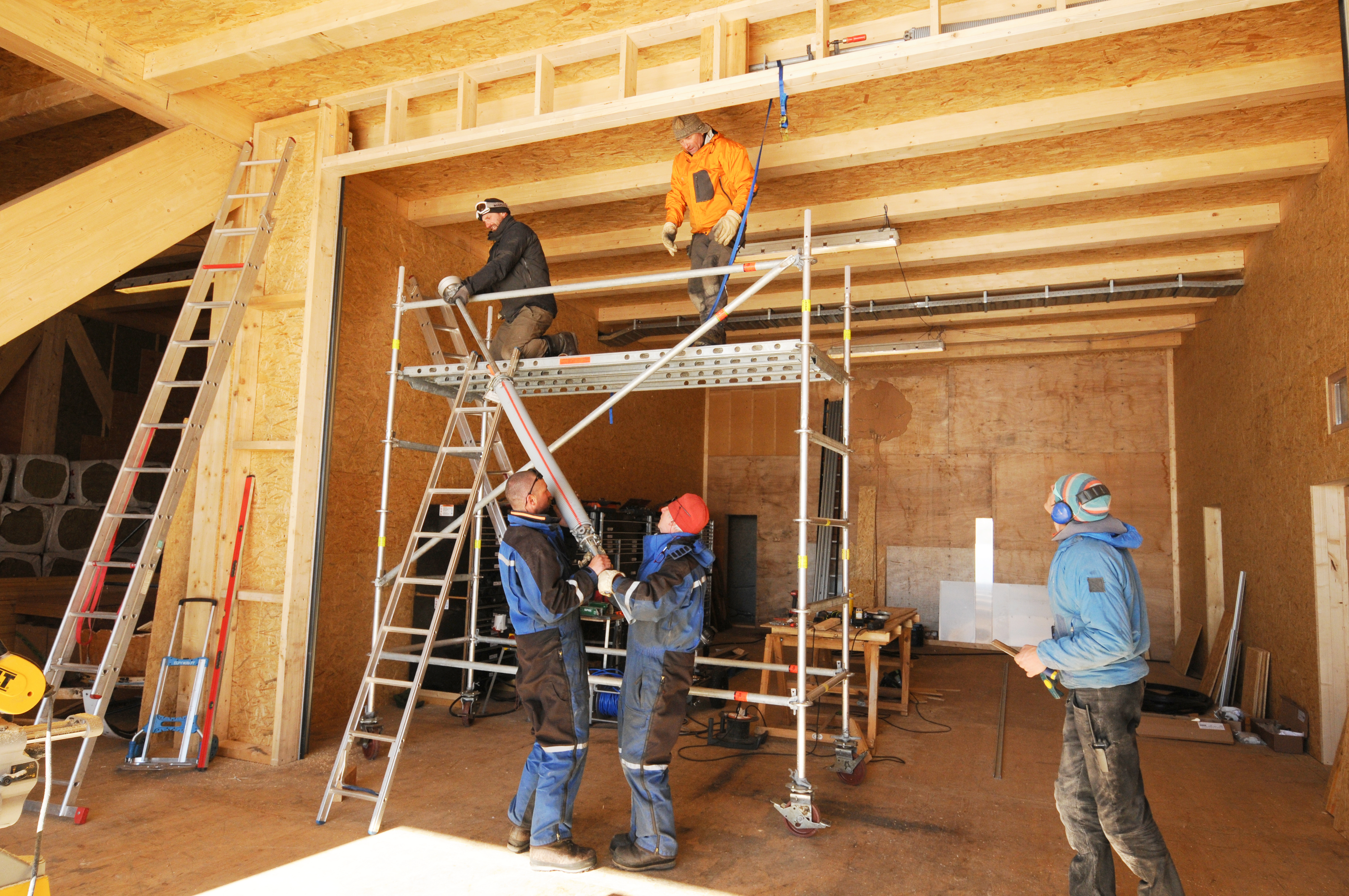 Installing the door opening mechanism in PEA's new garage