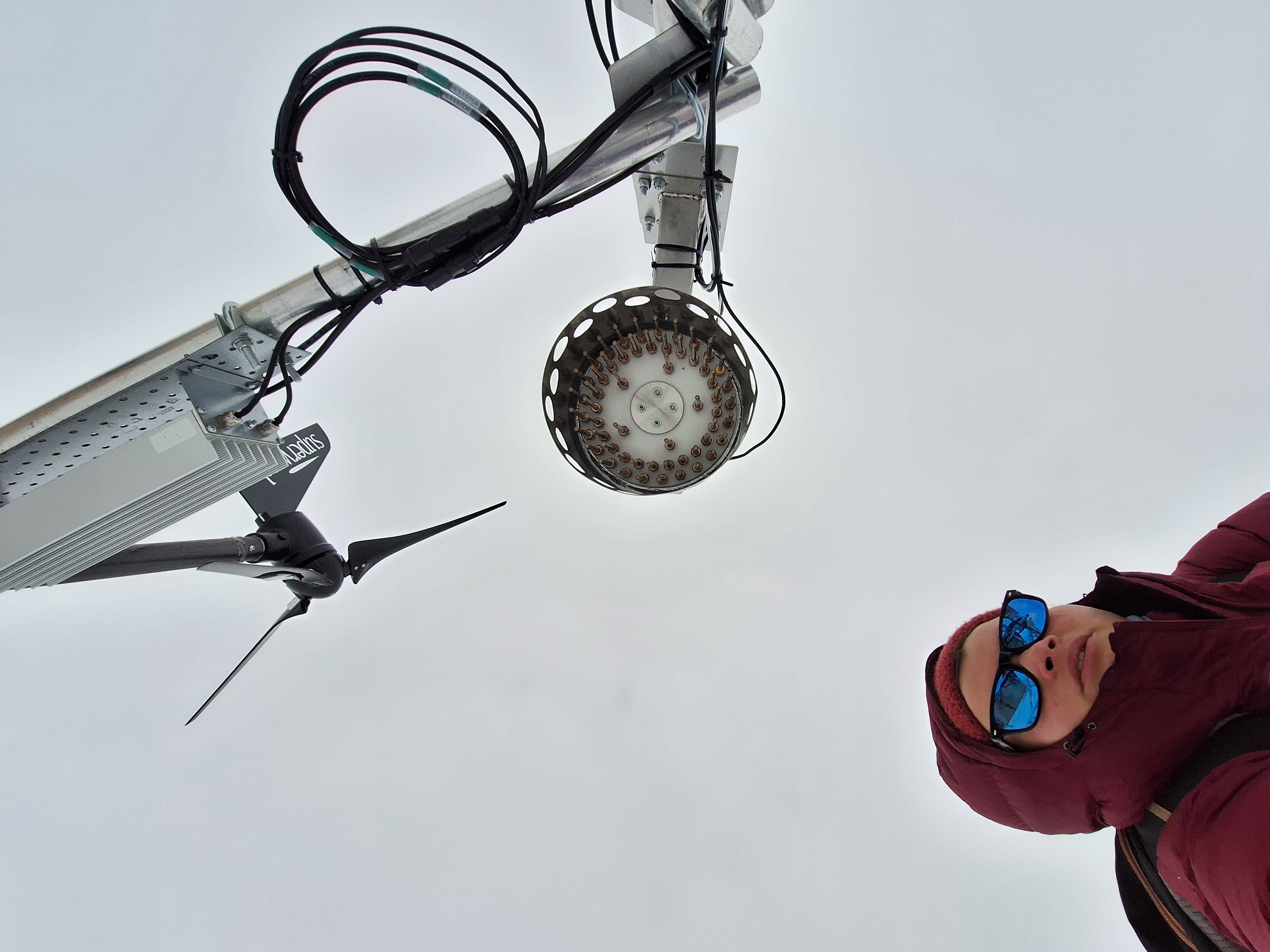 Sarah Wauthy (ULB) poses with the Volatile Organic Compound (VOC) automatic sampler for the PASPARTOUT project at the Queen Maud Land Coast
