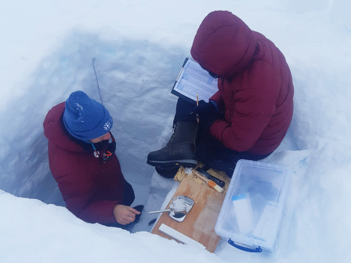 Digging a snow trench 