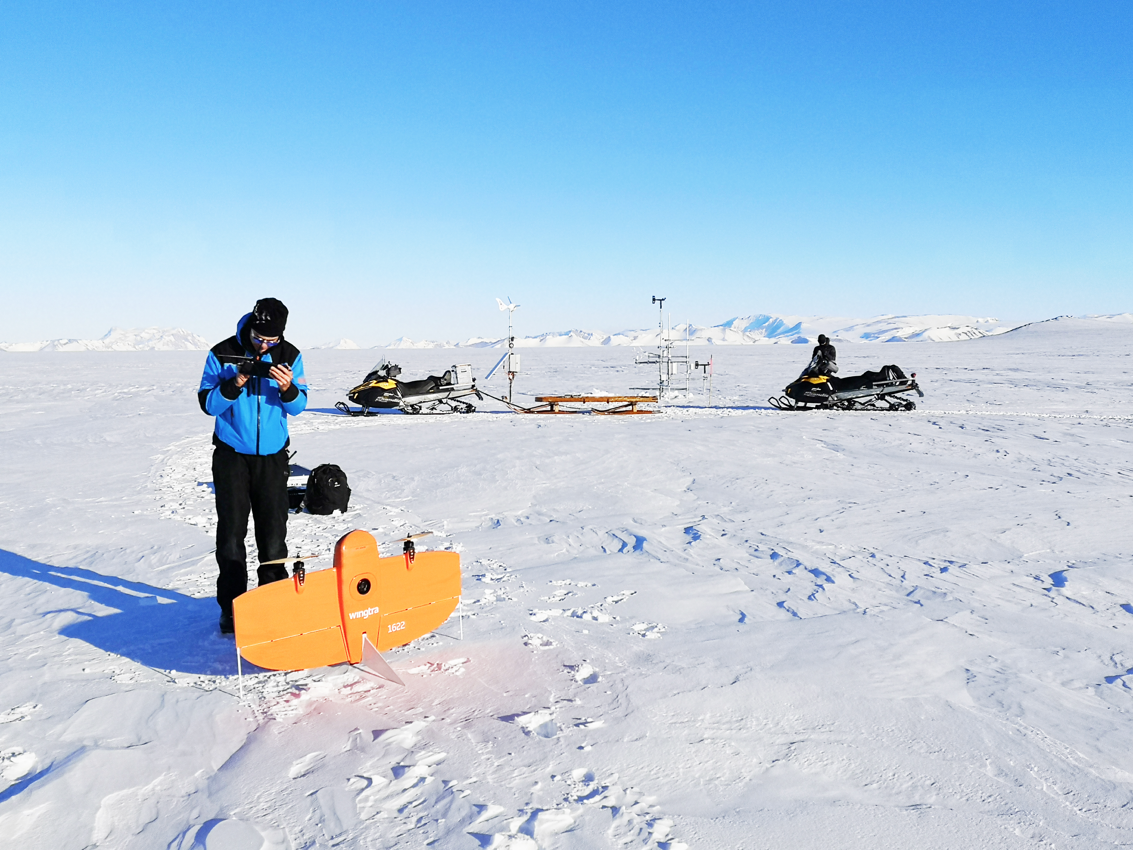 Armin Sigmund (EPFL) checks on a remote sensing station for the From Clouds to Ground project