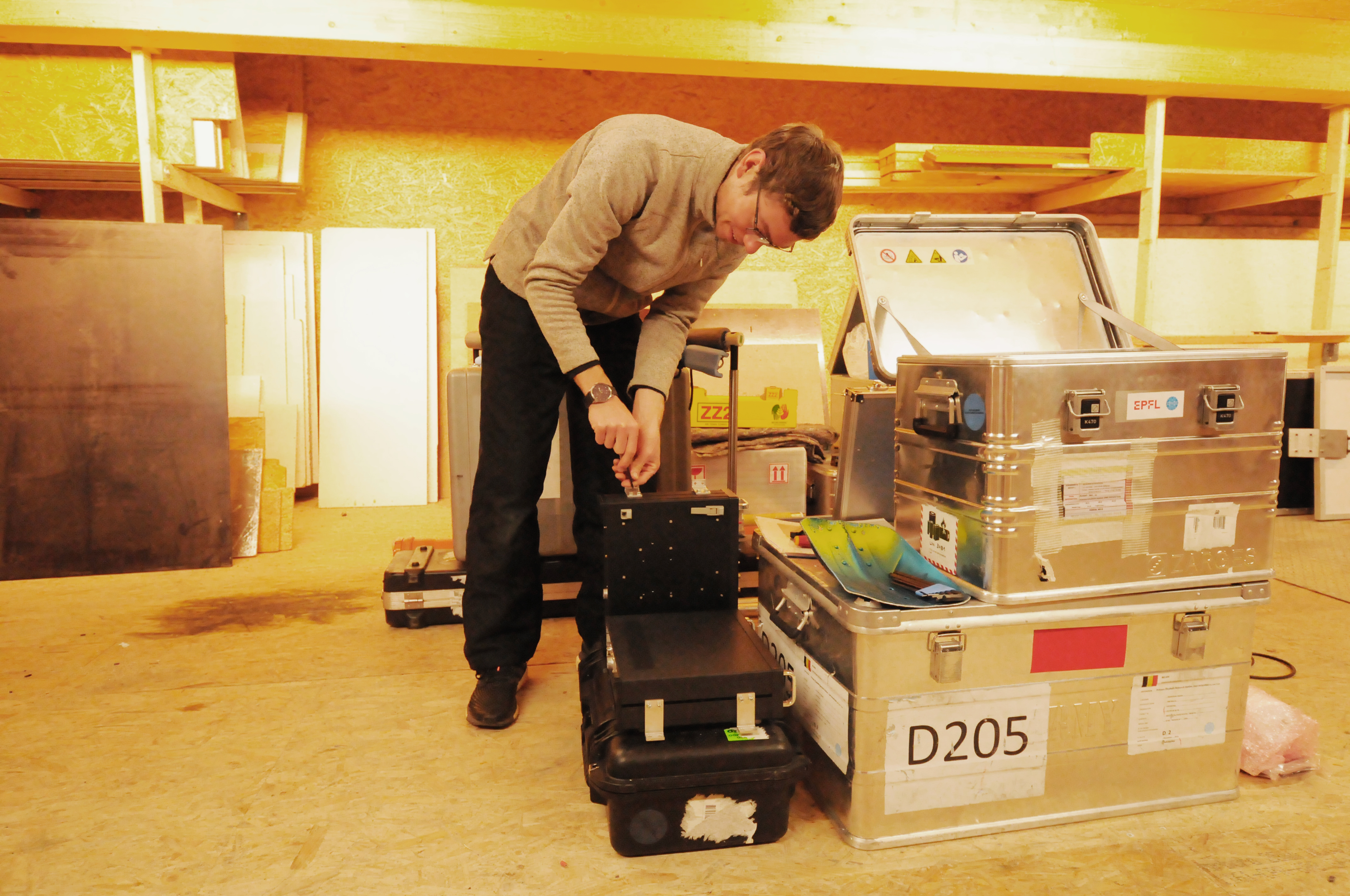 Armin Sigmund prepares equipment for the Clouds to Ground project field expedition 