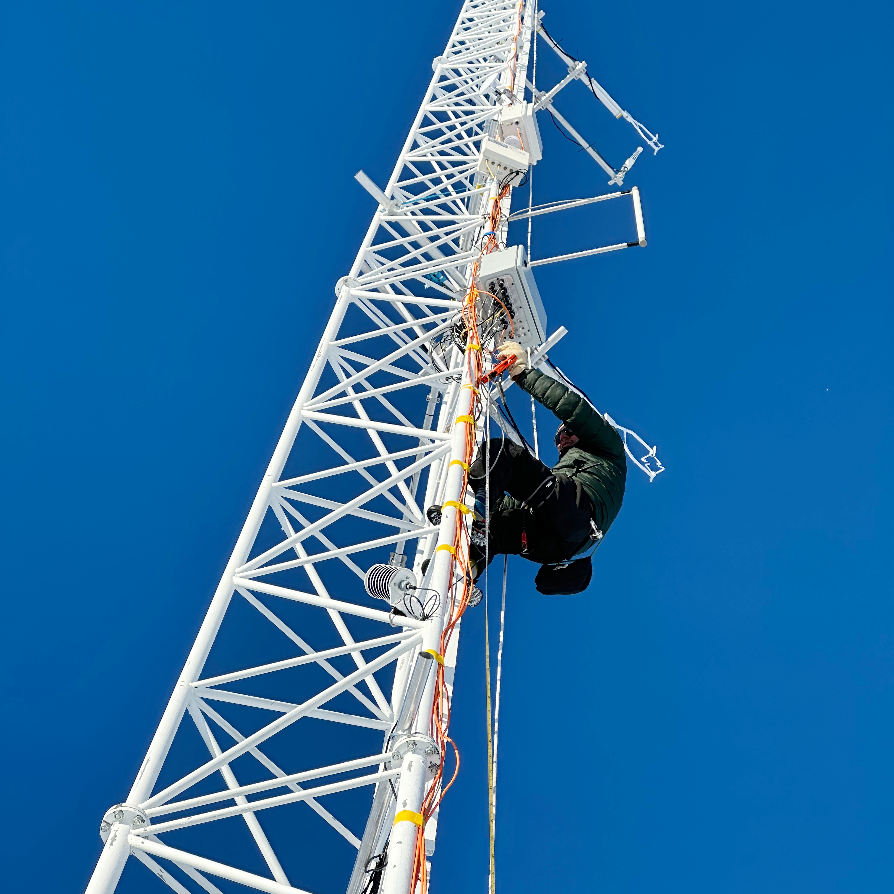 Doctor David Werlen climbing the tower at PEA