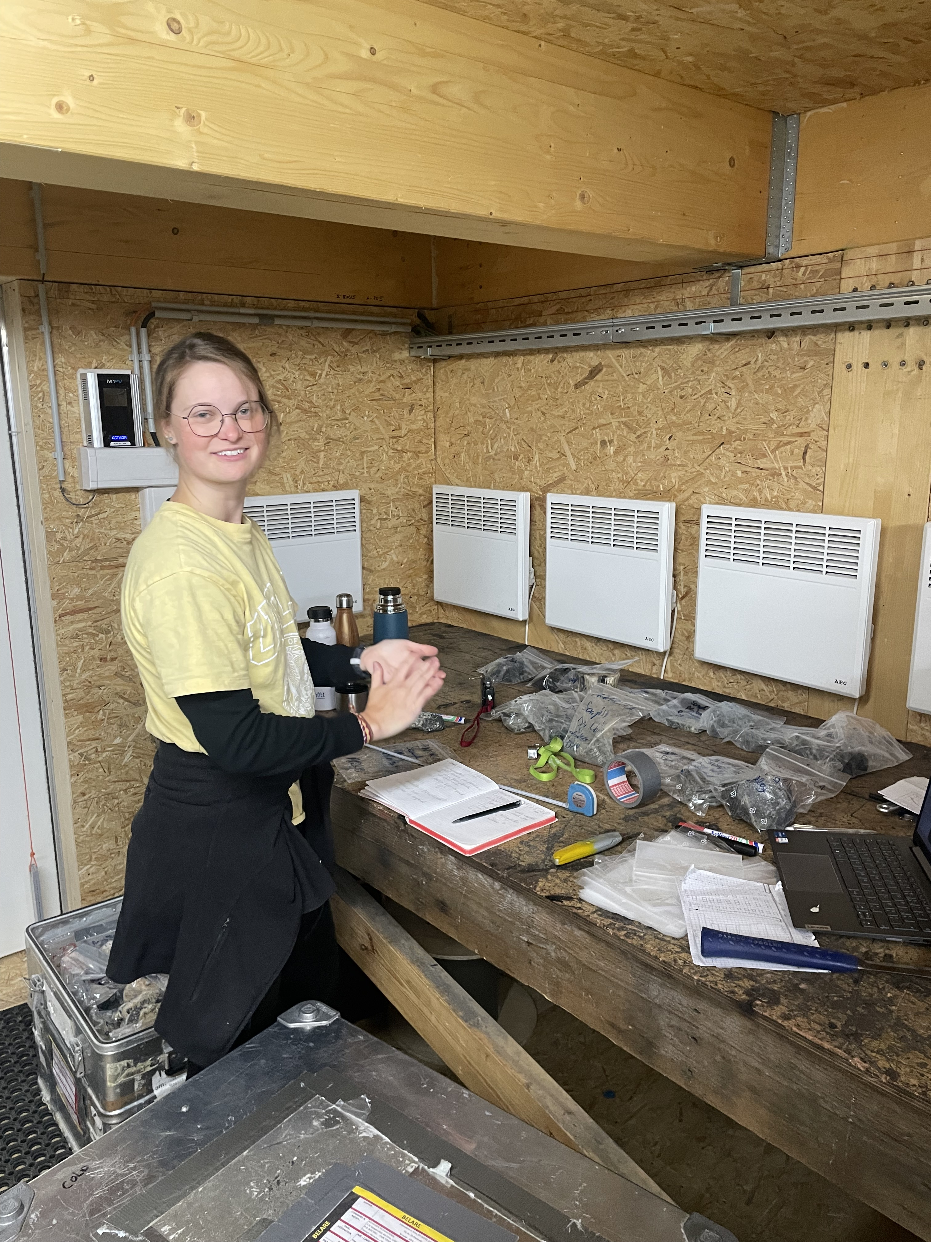 Sibylle Boxho examining her rocky finds
