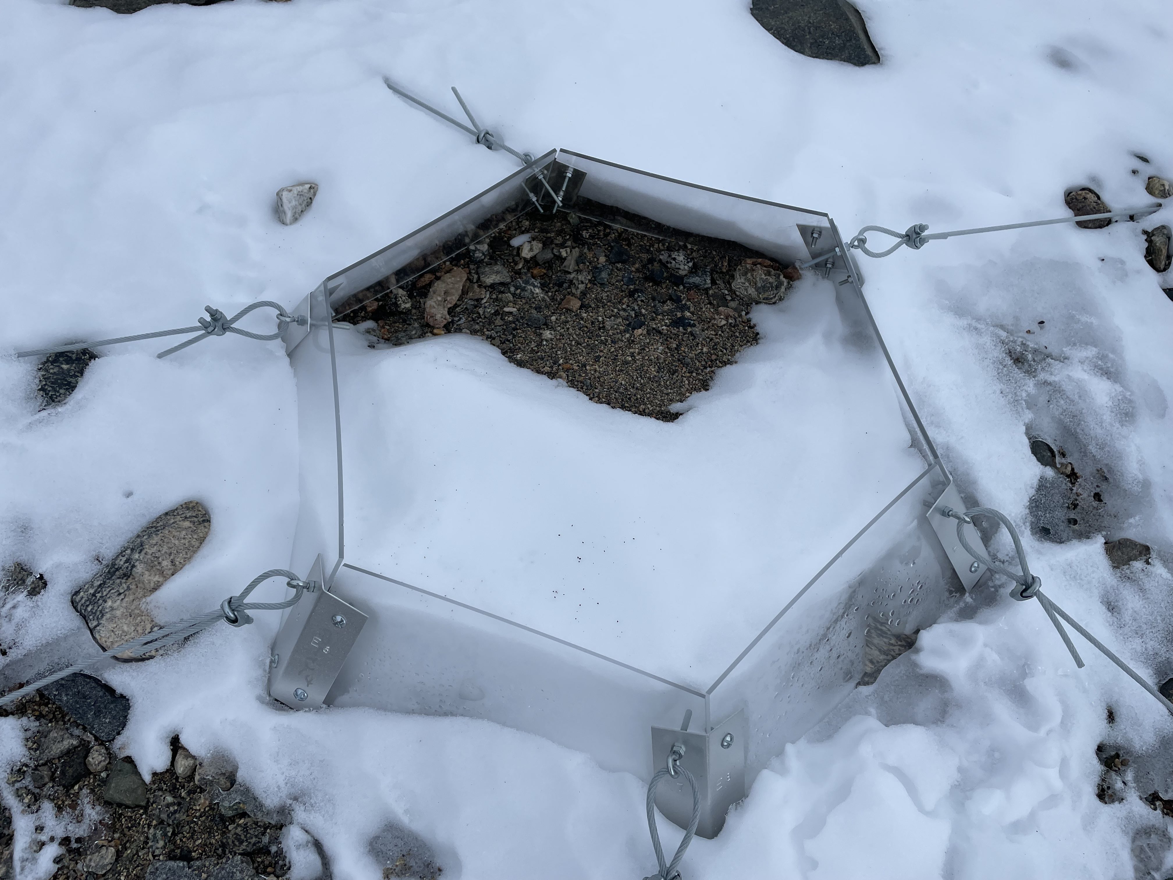 Open top chamber covered in snow