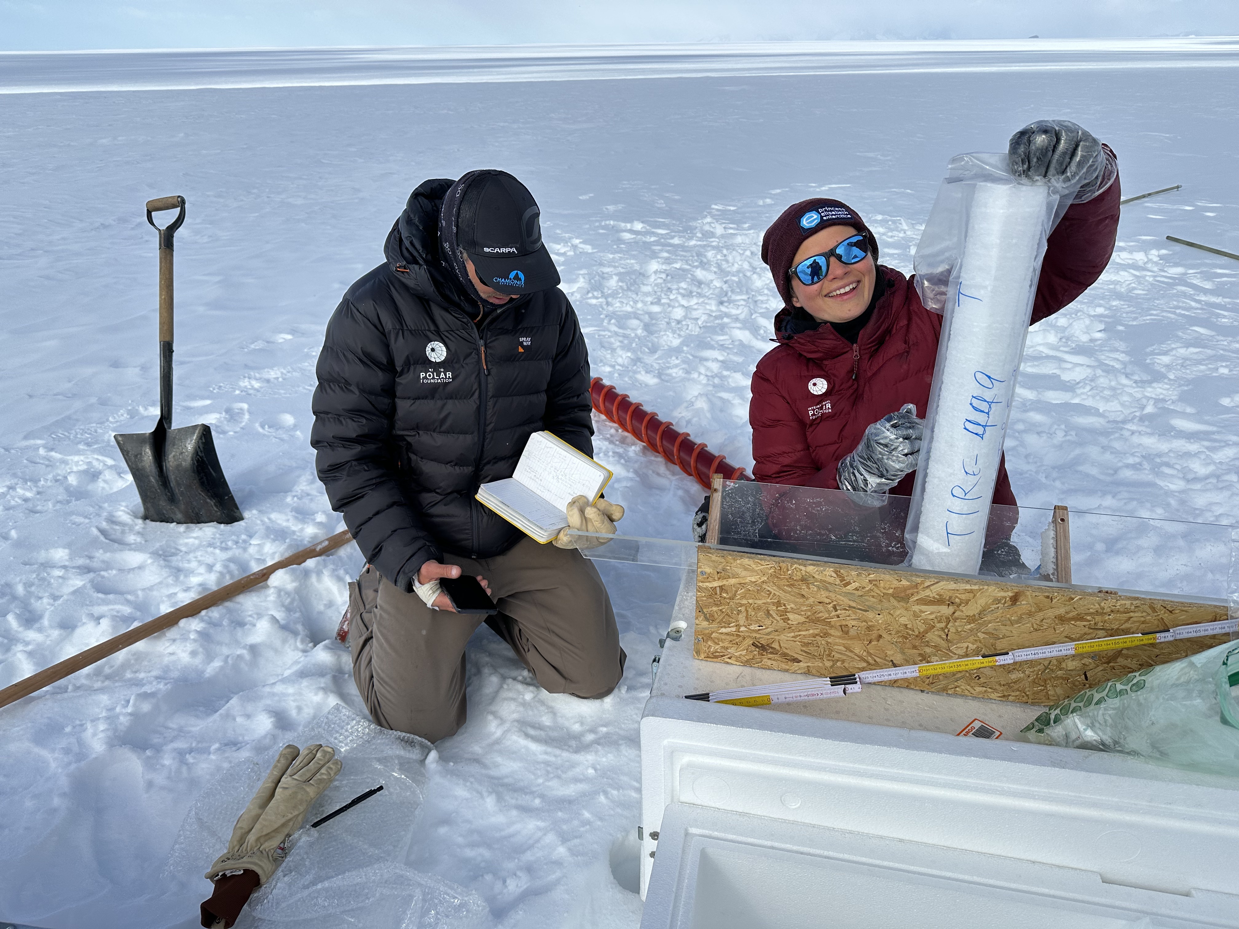 Sarah Wauthy (ULB) and field guide Sebastian Corret with a snow core taken near PEA for the PASPARTOUT project