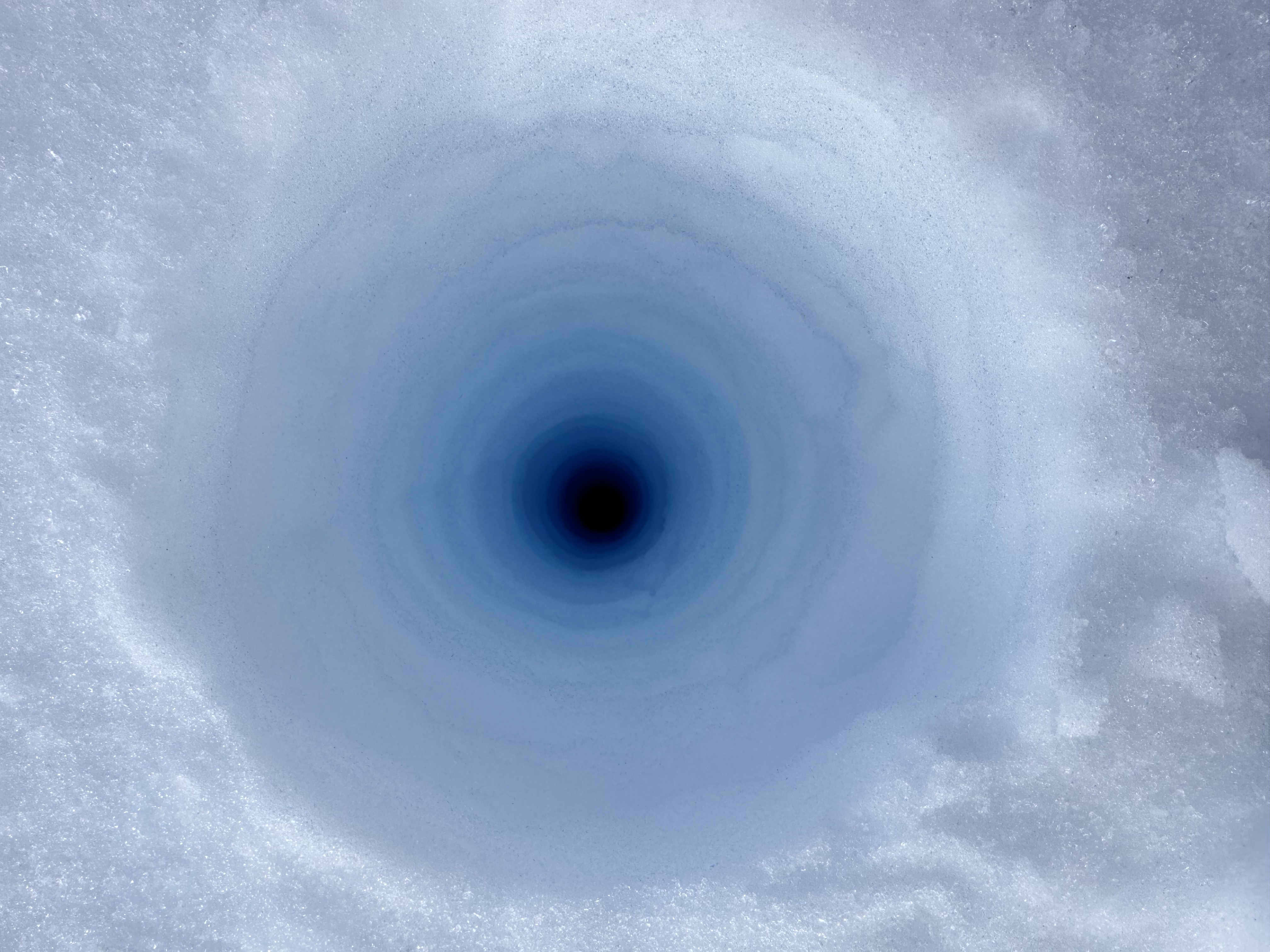 Looking inside a snow core borehole taken near PEA for the PASPARTOUT project