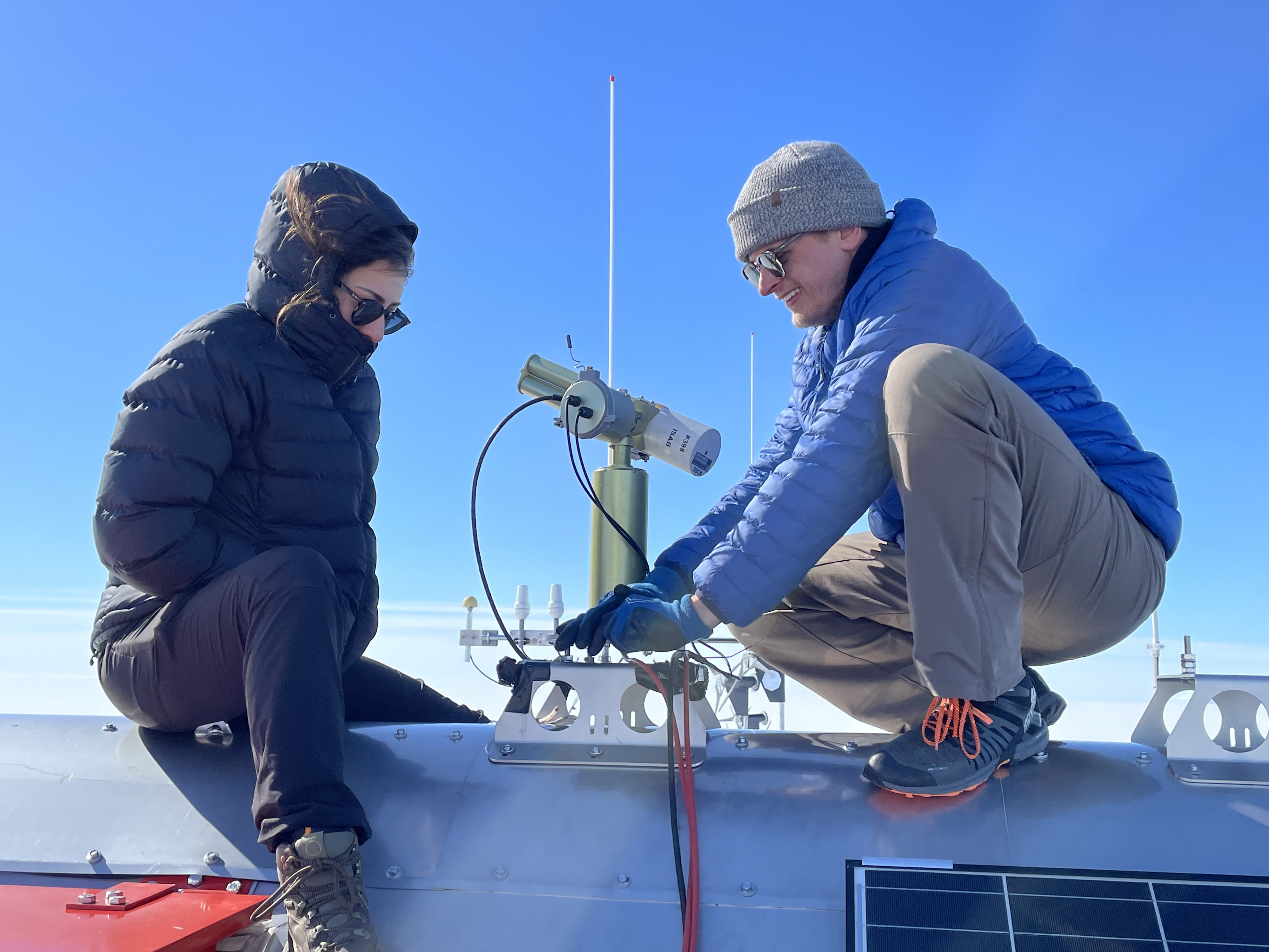 Installing CIMEL instrument on roof of PEA