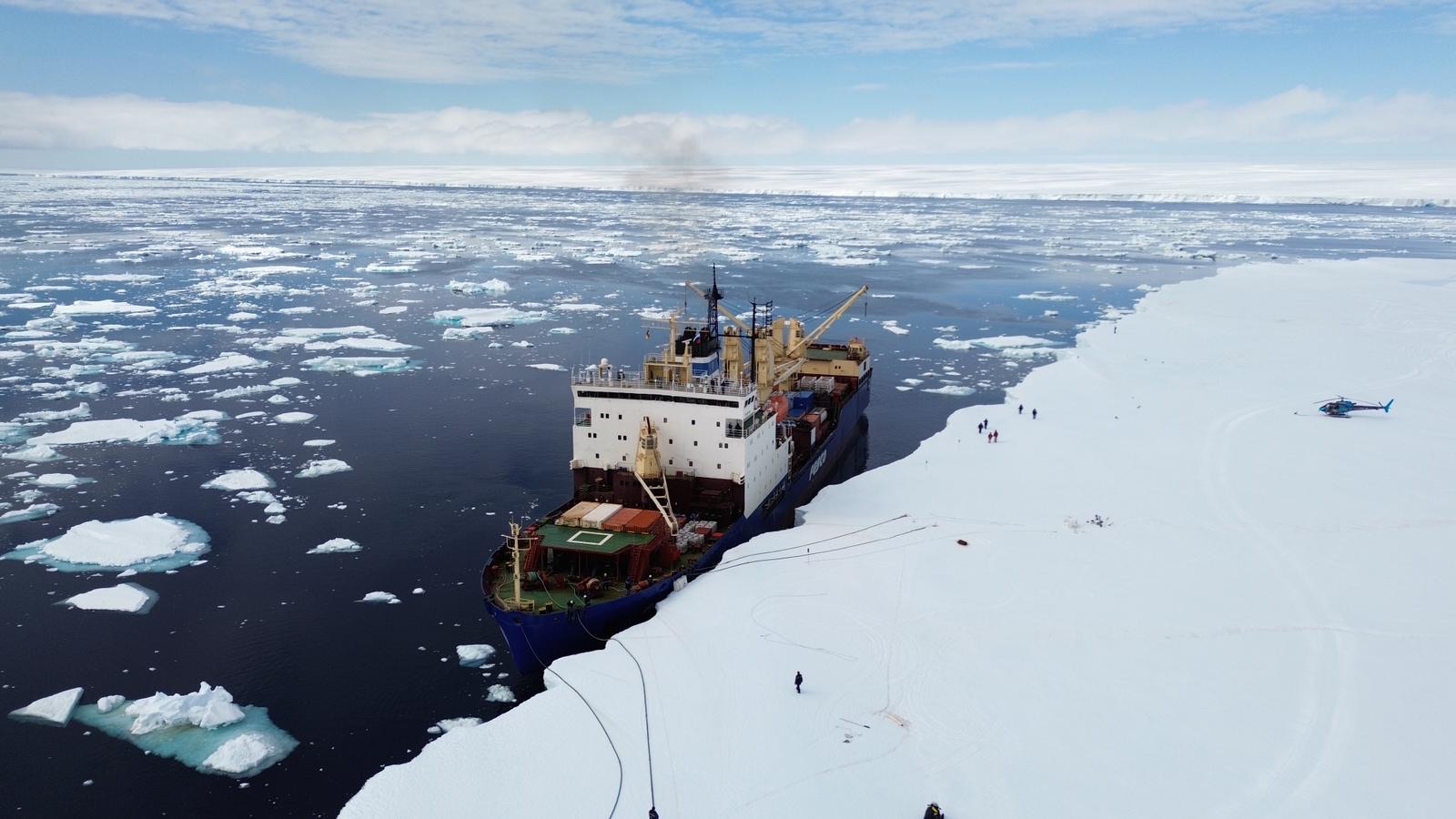 The cargo ship anchored at the coast of Queen Maud Land Antarctica.