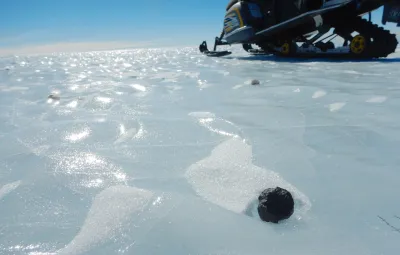 Meteorite in blue ice field near Belgica Mountains