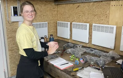 Sibylle Boxho examining her rocky finds