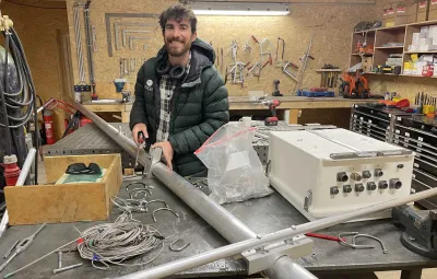 Simon Steffen working on weather station for the PEACE project