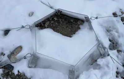 Open top chamber covered in snow