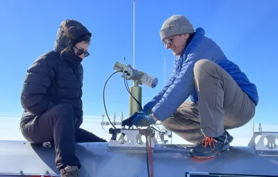 Installing CIMEL instrument on roof of PEA