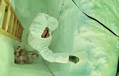 Sarah Wauthy taking snow samples in pit PASPARTOUT