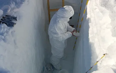 Paula digging trench to collect snow samples