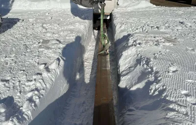Lowering the steel I-beam beneath PEA annex