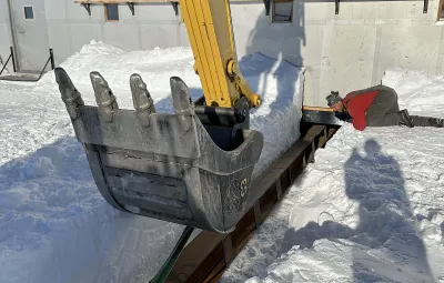 Placing metal I-beam underneath annex