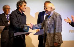 Alain Hubert receiving the 2024 Belgica Prize from Prof. Roland Souchez