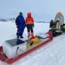 Ratnakar Gadi and Eric Rignot from UC Irvine pose with a radar seldge they used to image the King Baudoin Ice Shelf