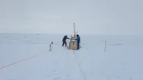 Drilling a hole in the King Baudoin Ice Shelf to take CDT measurements